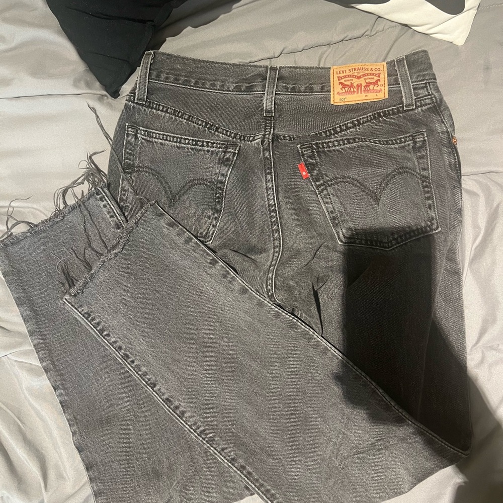 Levi’s 501 / black washed jeans / W25 L30